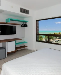 Apartamento Lateral Mar Duplo do Hotel Ponta Verde Maceió com vista parcial para o mar